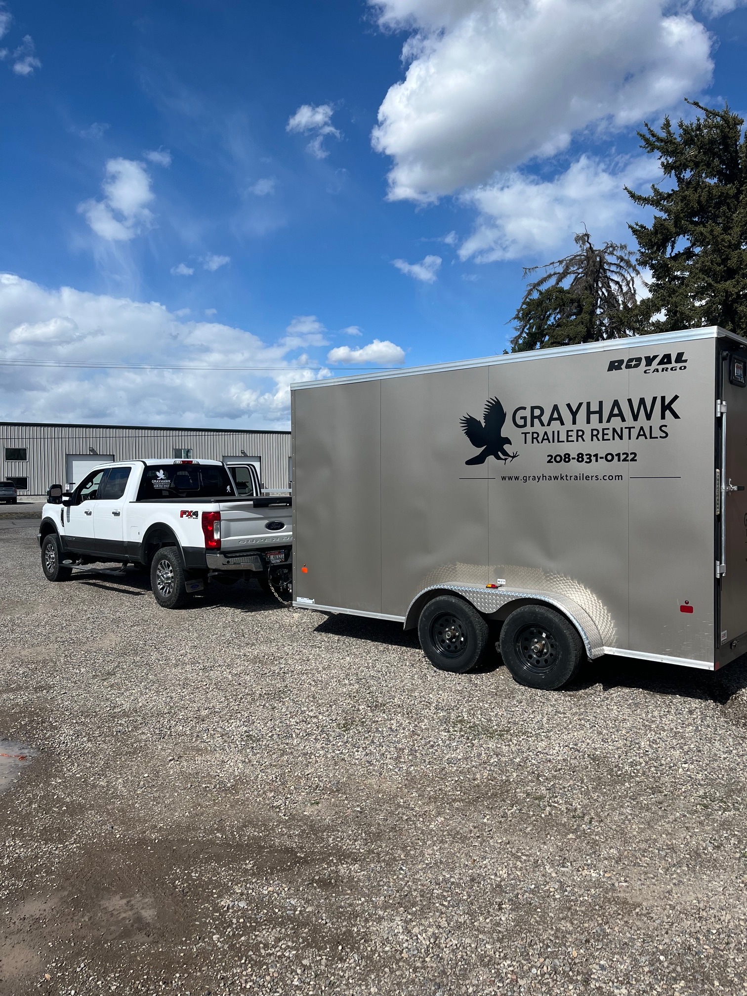 Truck towing a Grayhawk Trailer Rentals enclosed cargo trailer, available for rent in Menan, Idaho